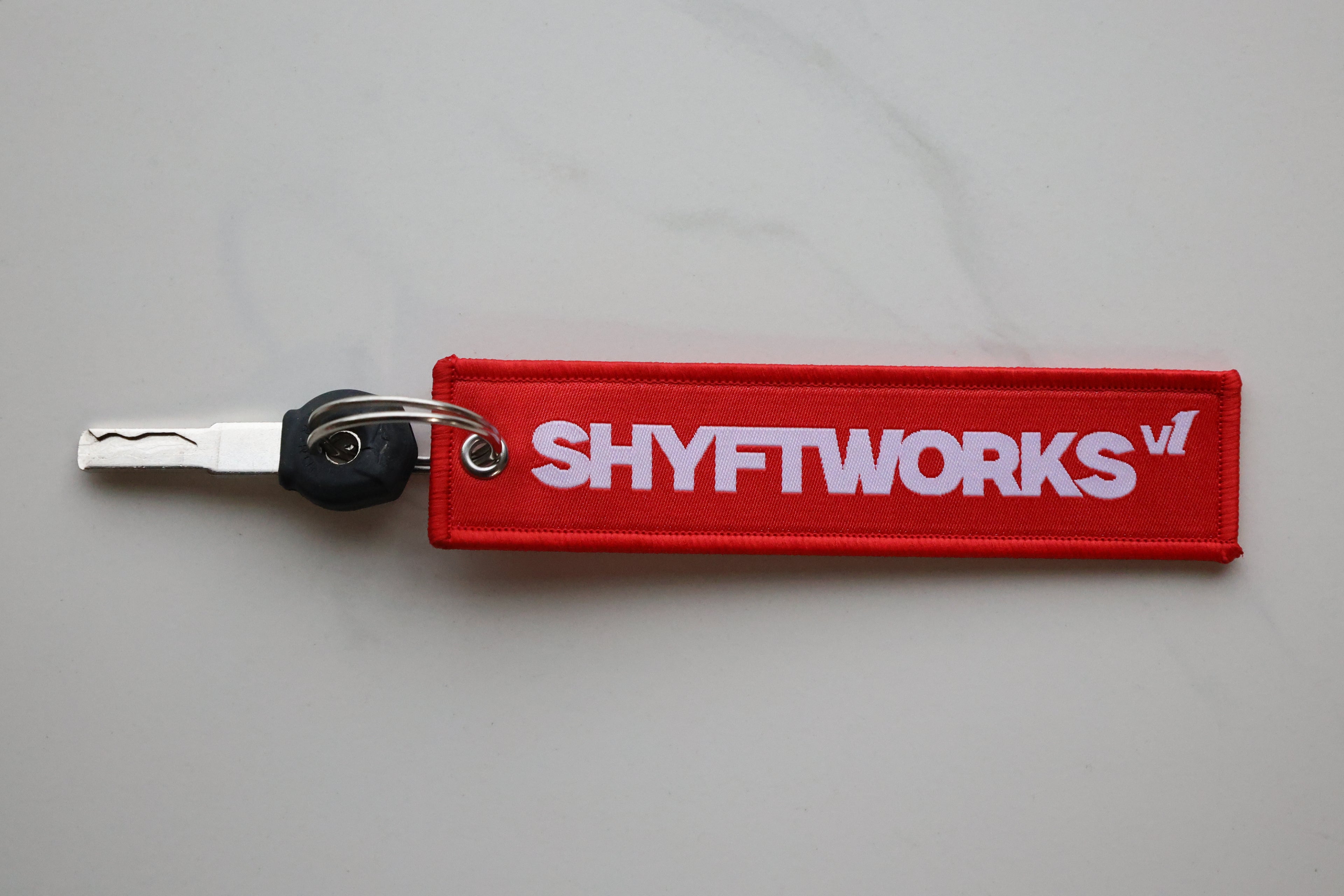 SHYFTWORKS Keychain and Sticker pack